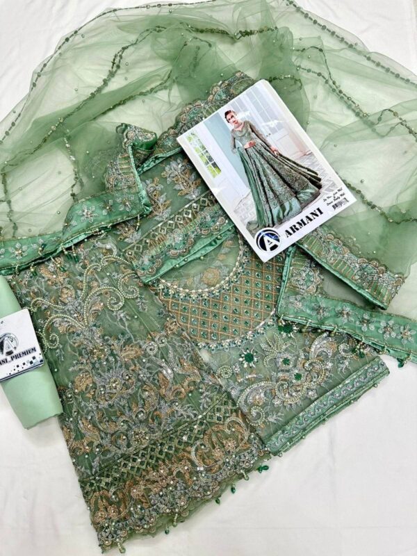 TOMI GREEN - Image 2